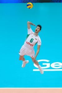 Bulgaria's Rozalin Penchev (6) serves during a FIVB Men's Volleyball World League match between the USA and Bulgaria in Dallas, Texas.